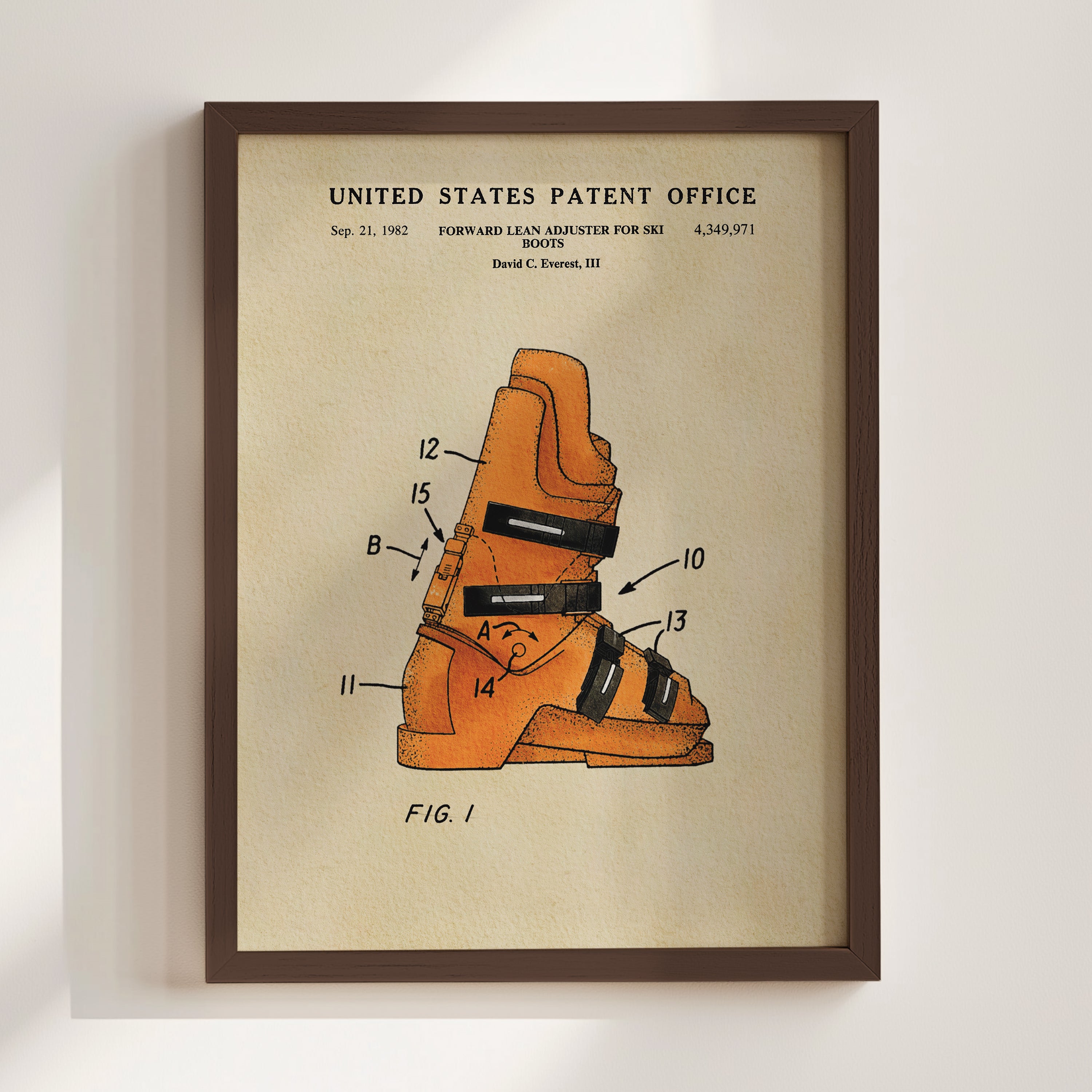 The image is a framed patent drawing depicting a pair of orange ski boots with various numbered labels and annotations.