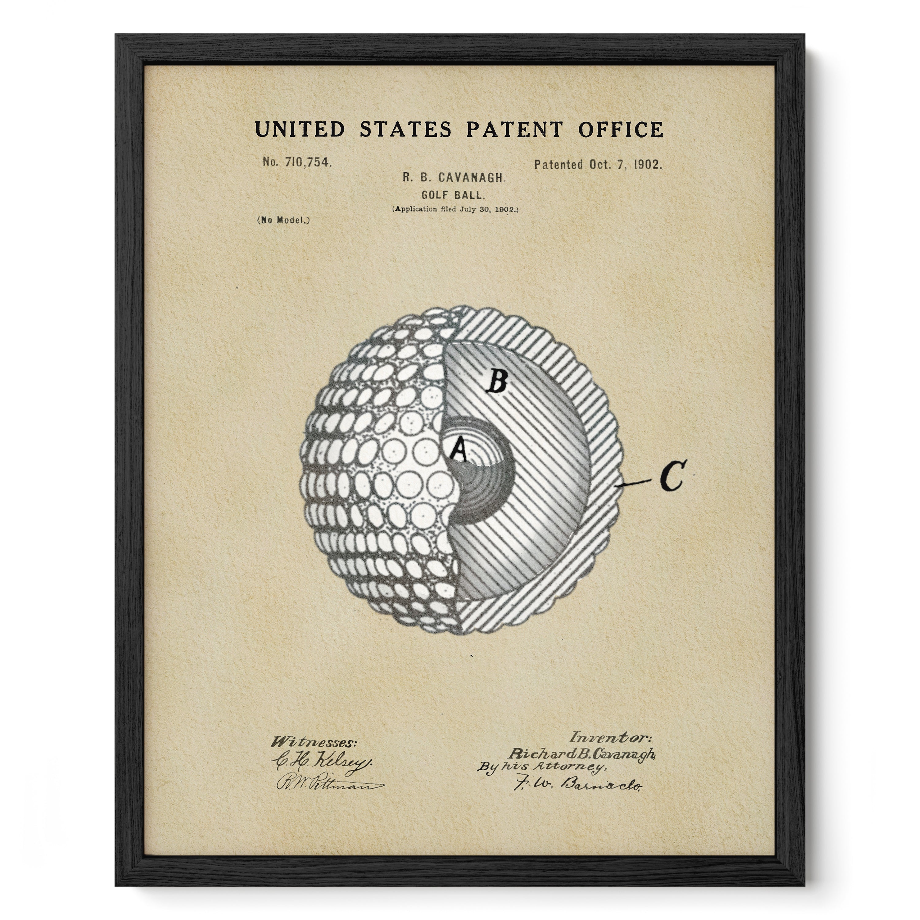 The image is a framed vintage patent drawing of a golf ball, depicting the inside of the ball with a cross-section view.