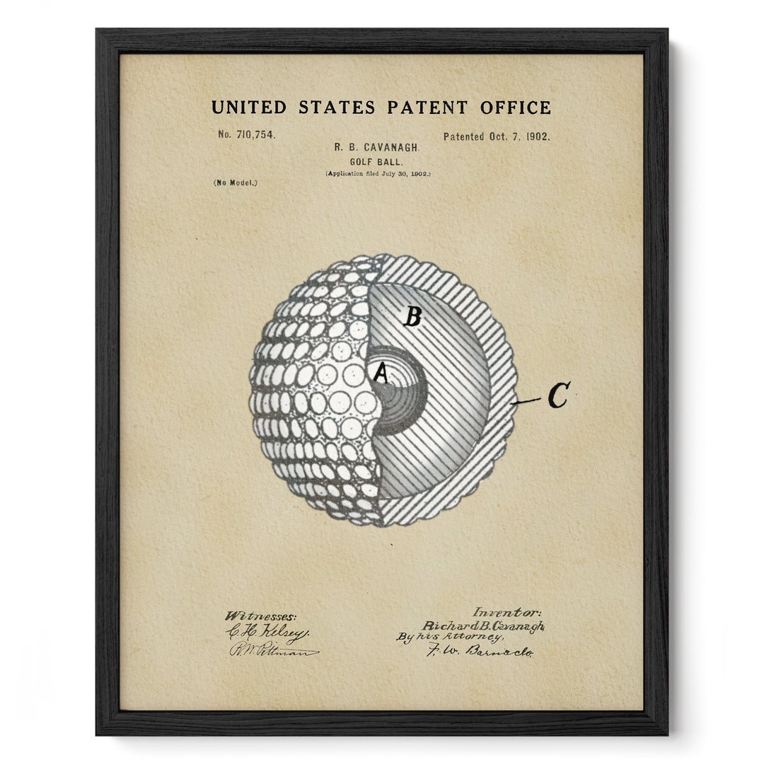 The image is a framed vintage patent drawing of a golf ball, depicting the inside of the ball with a cross-section view.