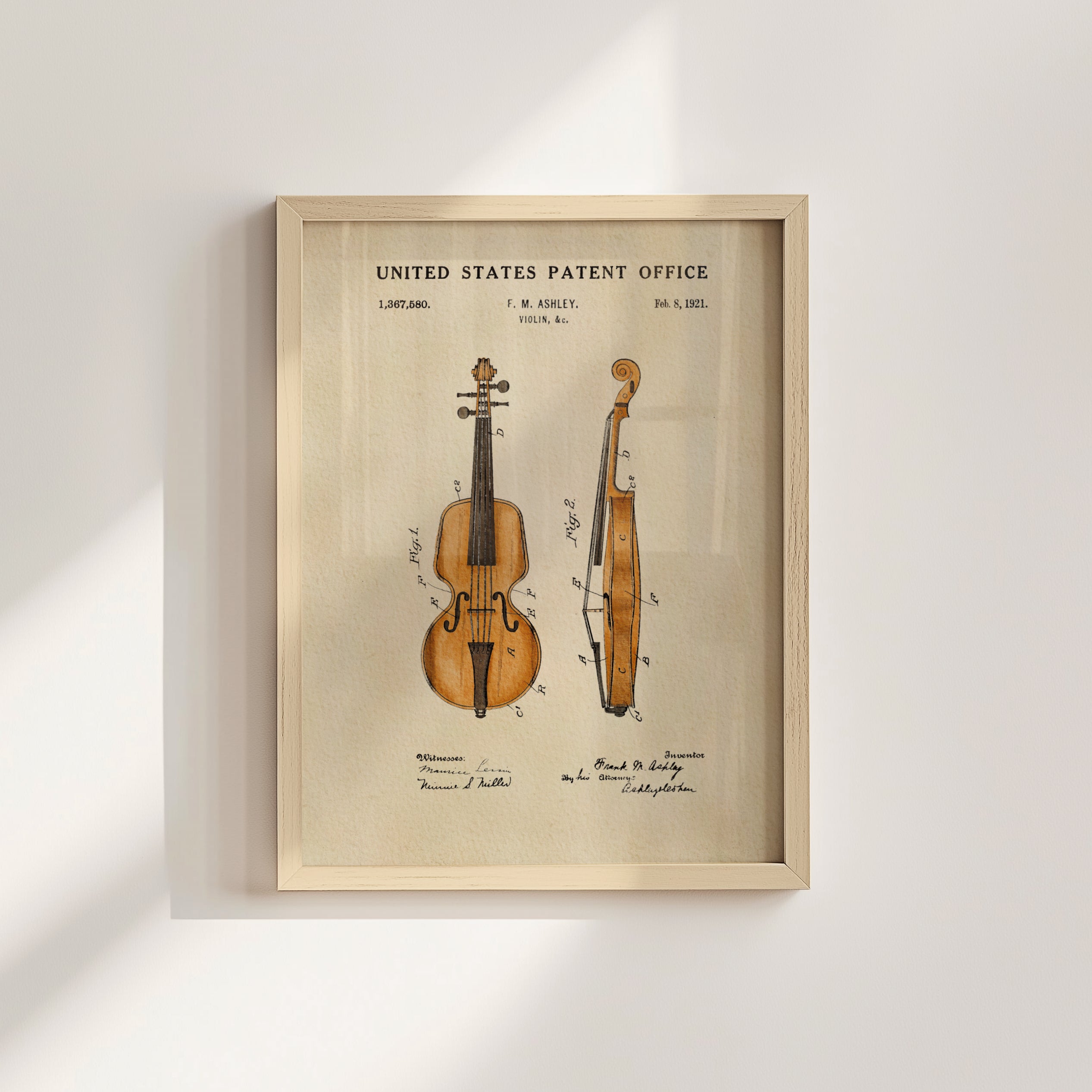 The image is a framed patent drawing of a violin, depicting the instrument in two views.