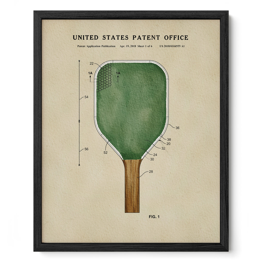 The image is a framed print depicting a paddle with a green paddle head and a brown paddle handle, along with a diagram and text indicating it is a patent application from the United States Patent Office.