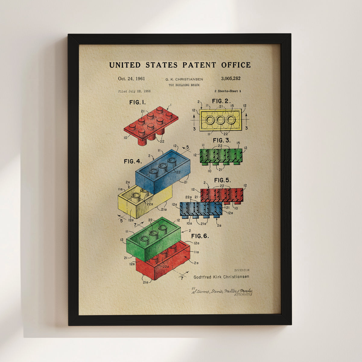The image is a framed patent drawing from the United States Patent Office, depicting various Lego brick designs and their corresponding patent applications.