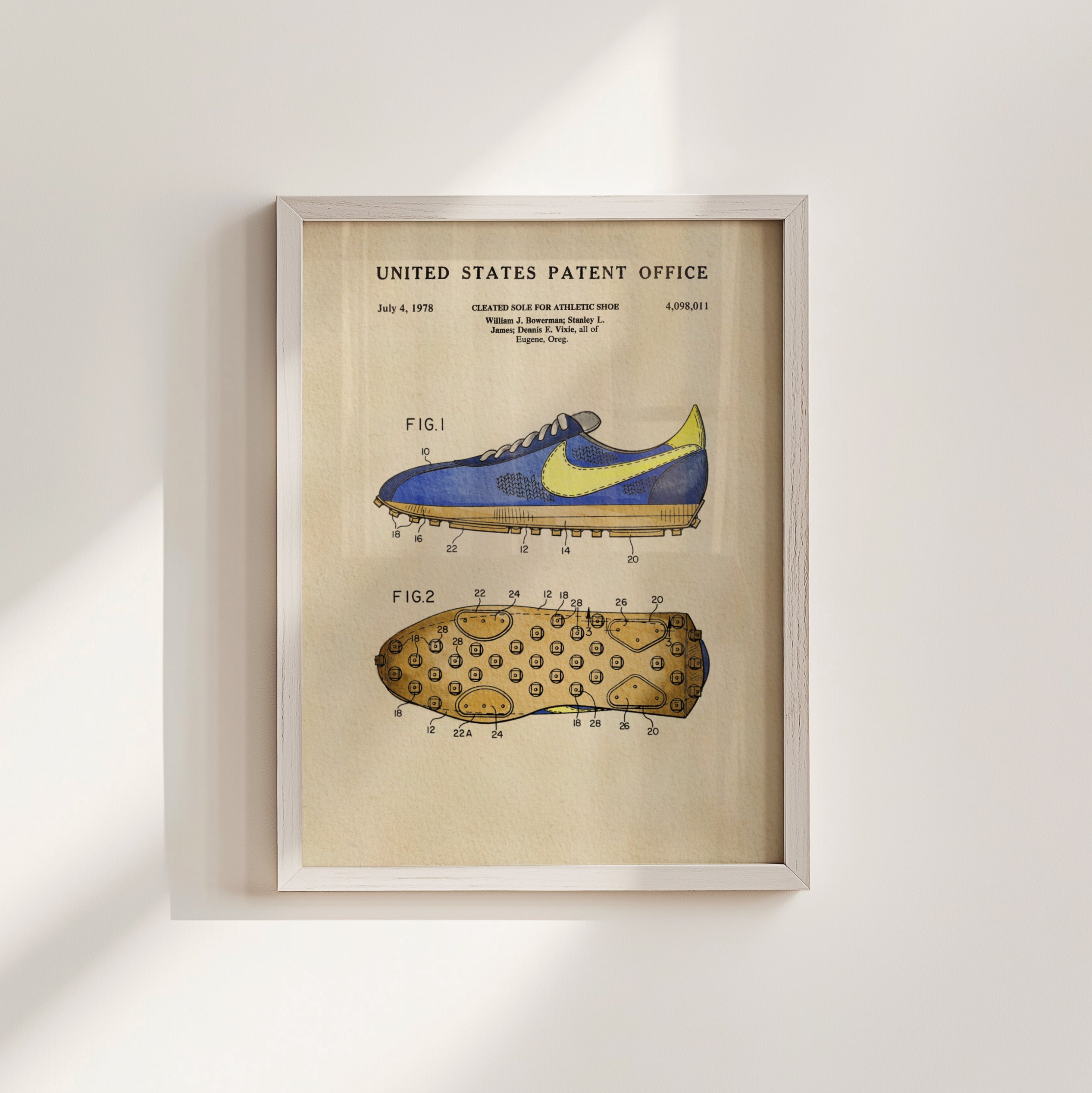 The image is a framed patent drawing depicting a blue and yellow sneaker with a yellow sole and a yellow heel.