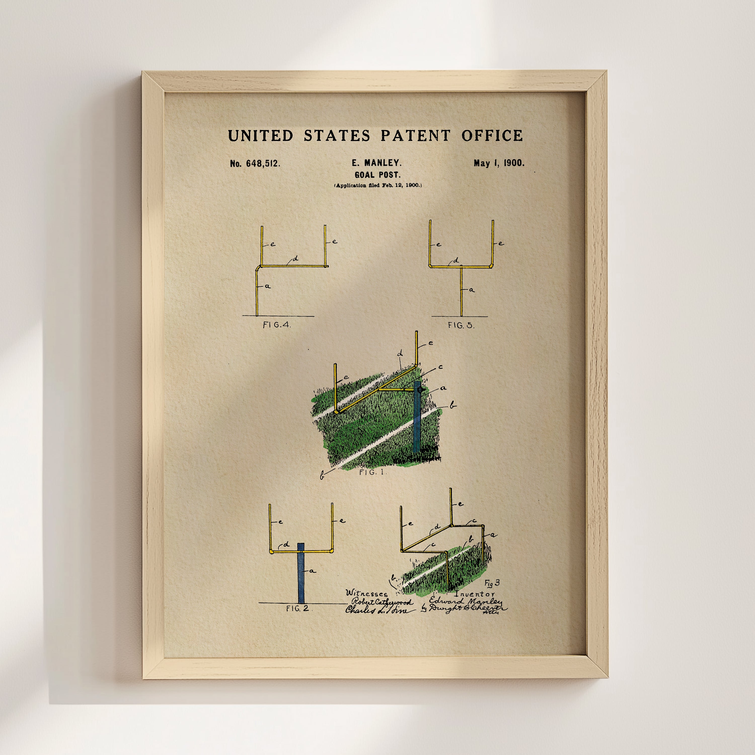 The image is a framed poster or print featuring a detailed illustration of a football field with various elements such as goalposts, a football, and a diagram of the field layout.