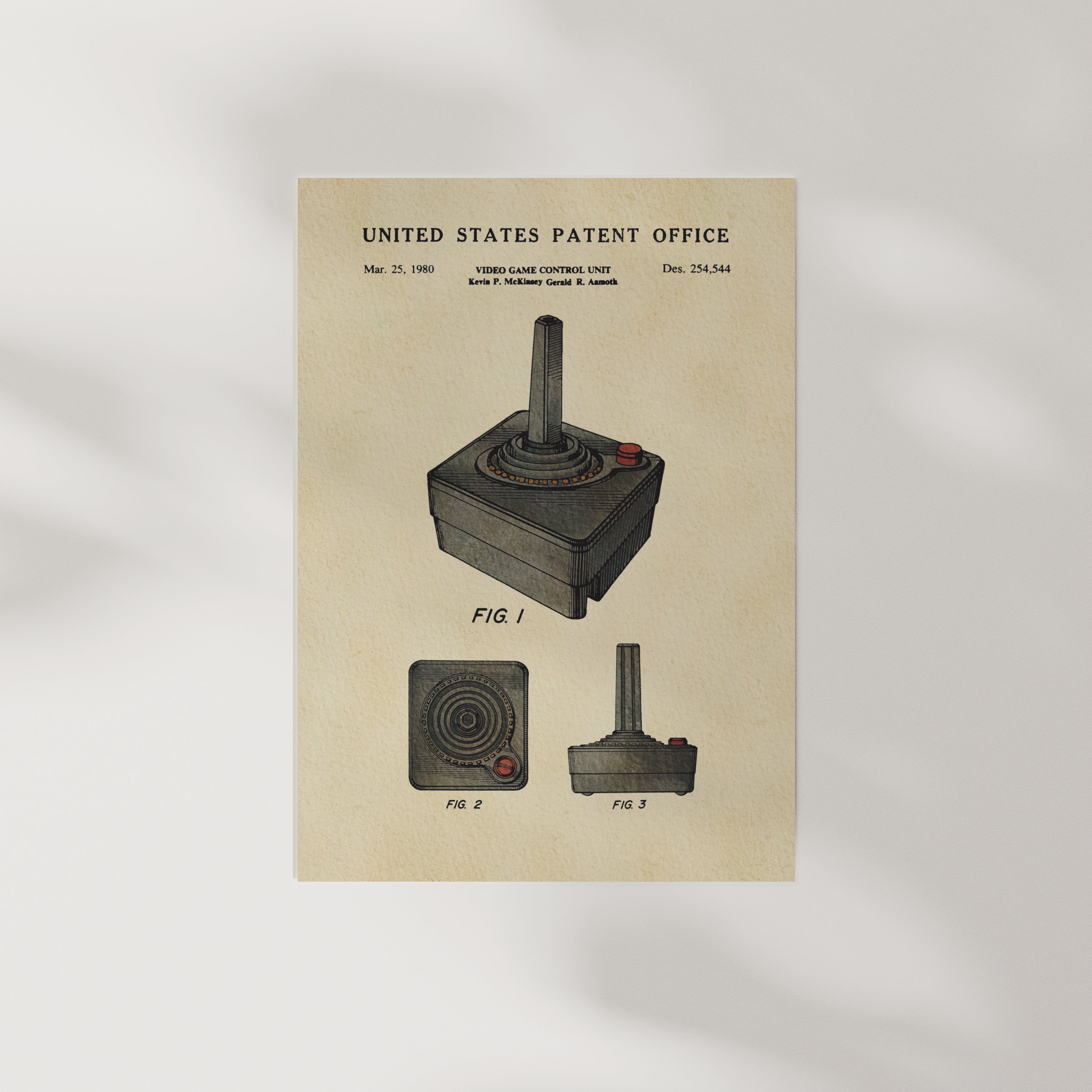 The image is a patent drawing of a joystick from the 1980s, depicting the joystick control unit and a figure of a joystick.