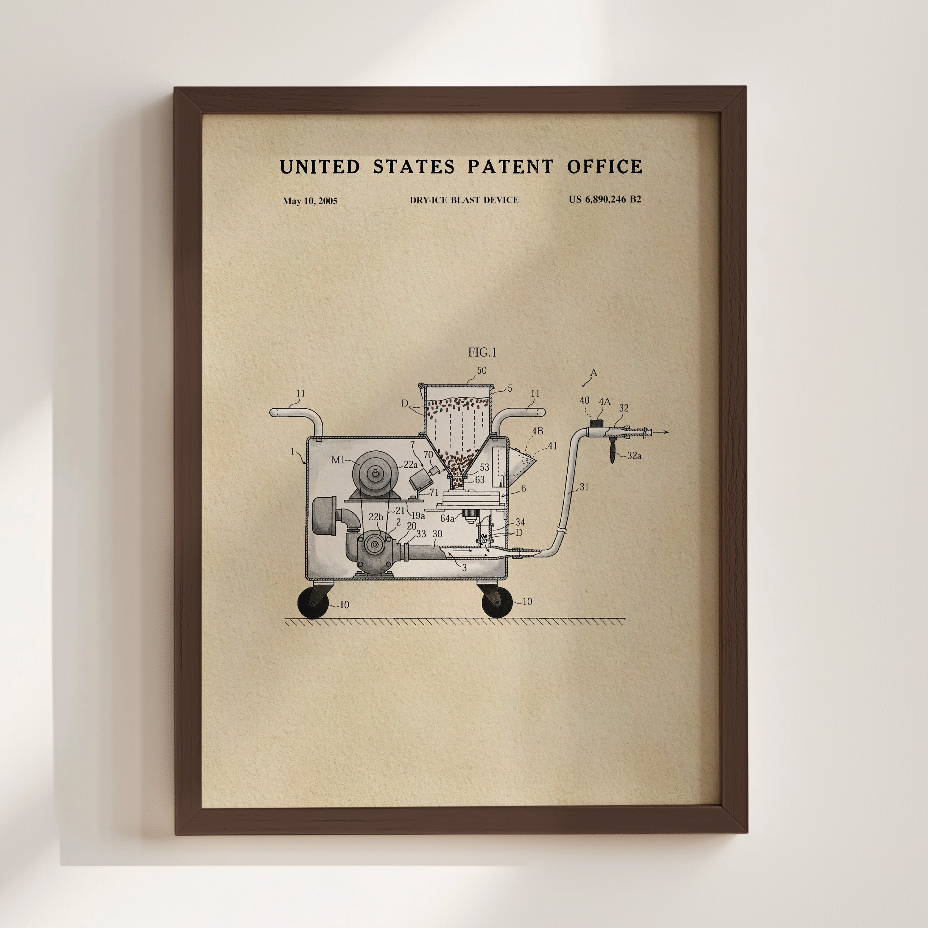 The image is a framed patent drawing depicting a device with a mechanical or technological component, likely related to the United States Patent Office.