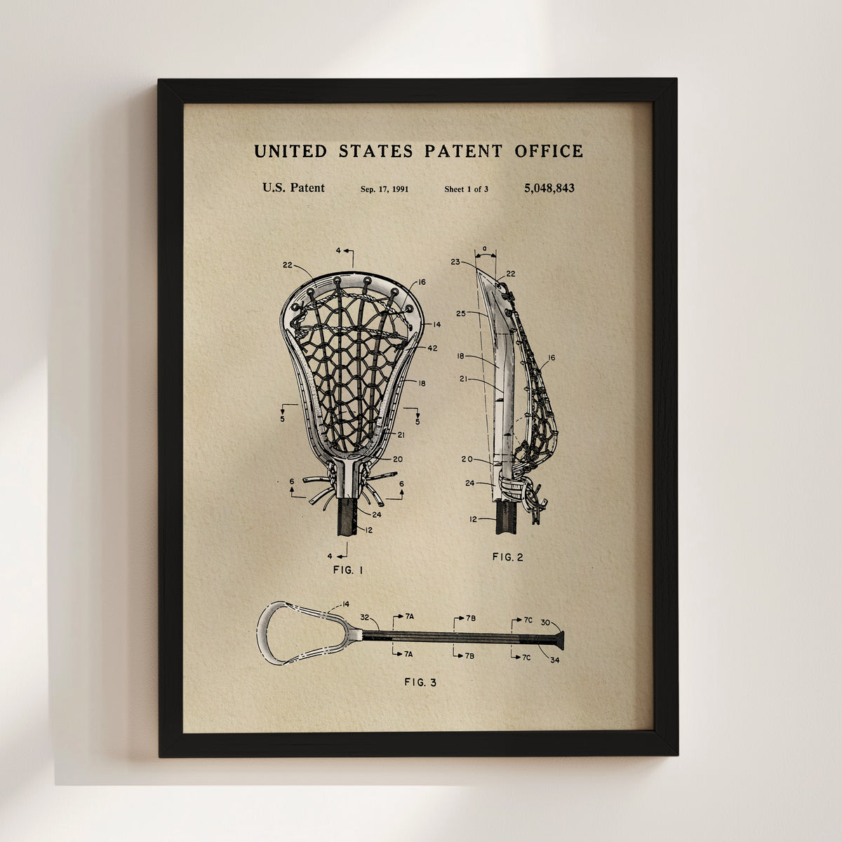 The image is a framed patent drawing of a lacrosse net, depicting the net and its components in a detailed manner.
