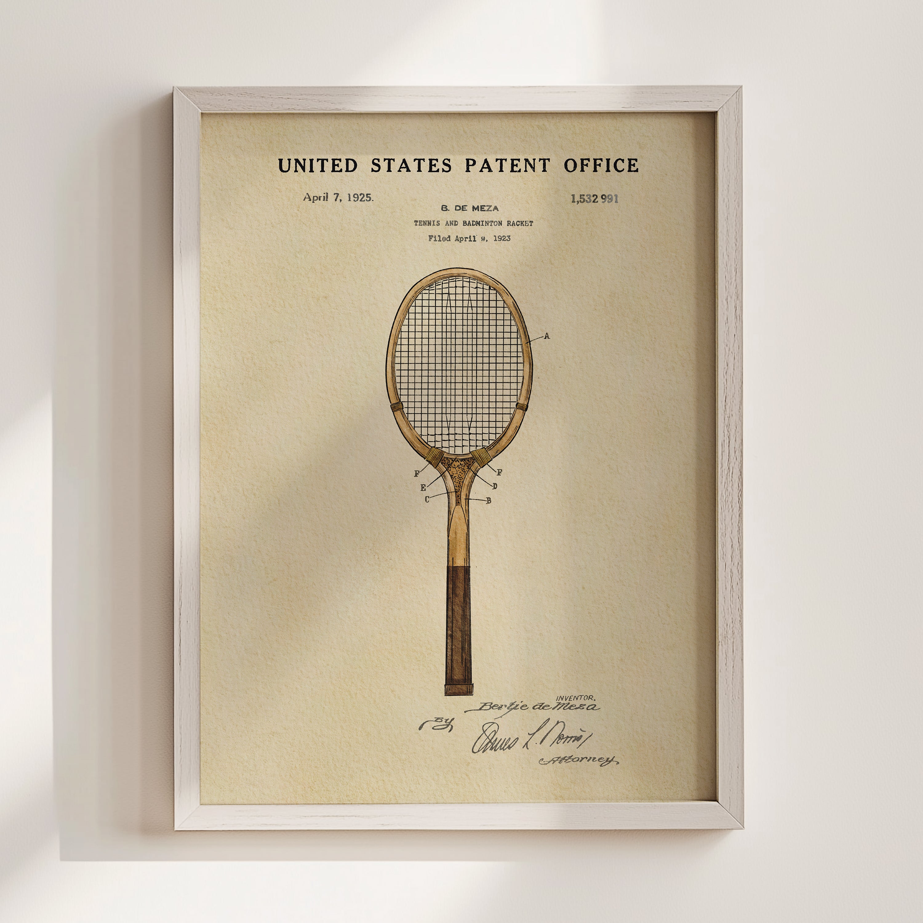 The image is a framed patent drawing of a tennis racket, depicting a design from the United States Patent Office.
