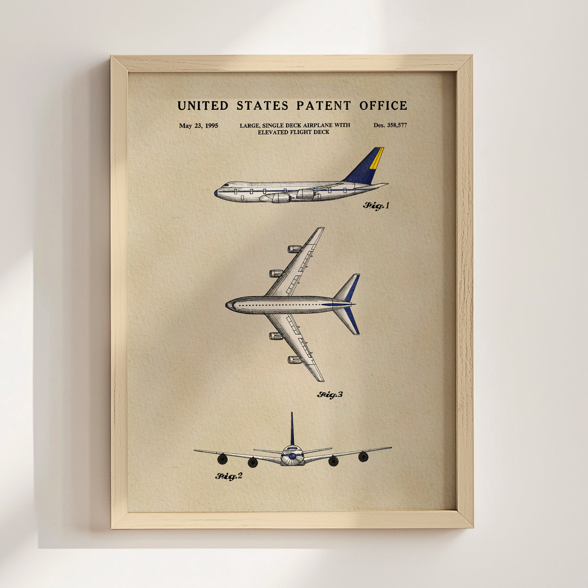 The image is a framed patent drawing depicting three different airplanes, including a large single-engine airplane with an elevated flight deck.