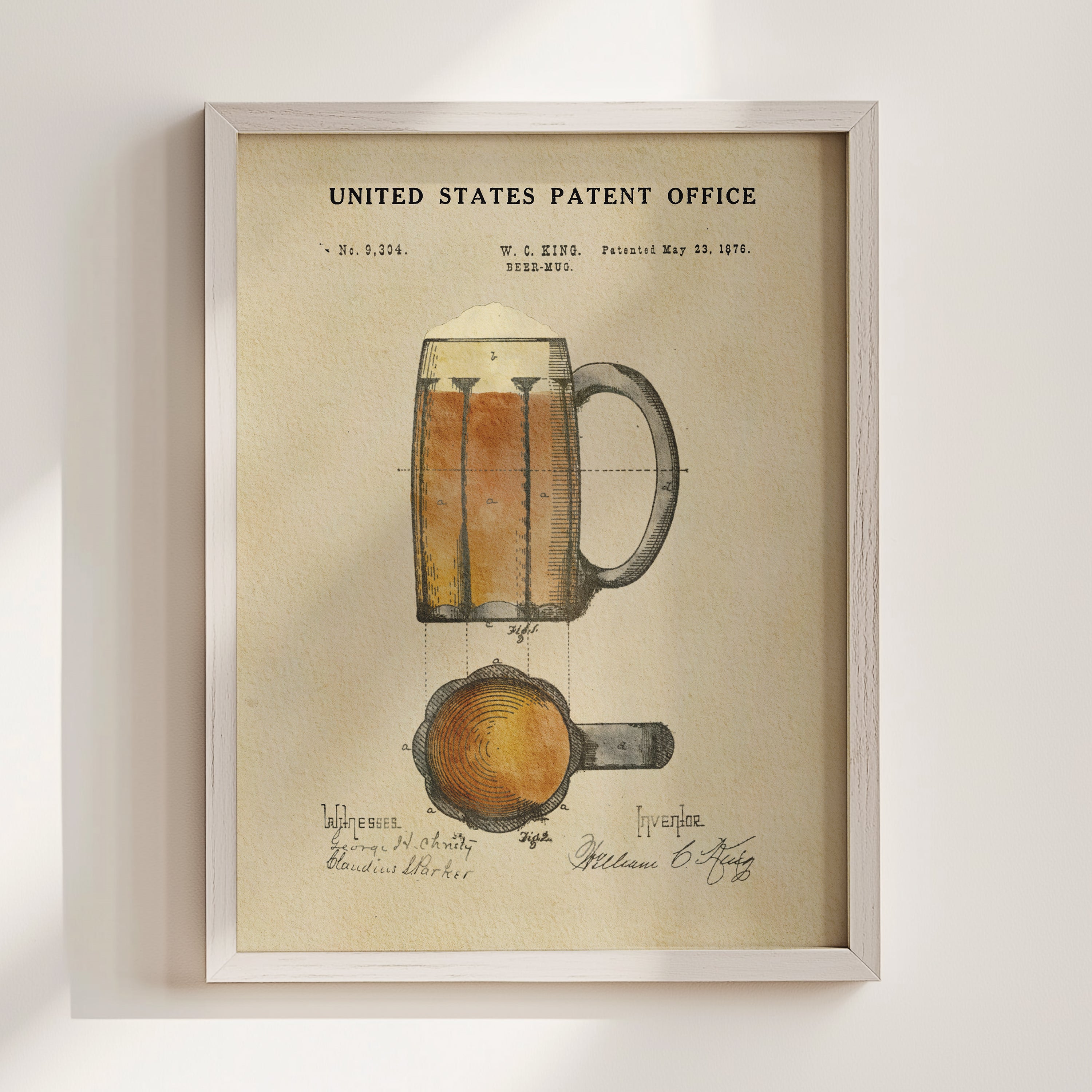 The image is a framed print of a beer mug patent drawing from the United States Patent Office, dated May 23, 1976.