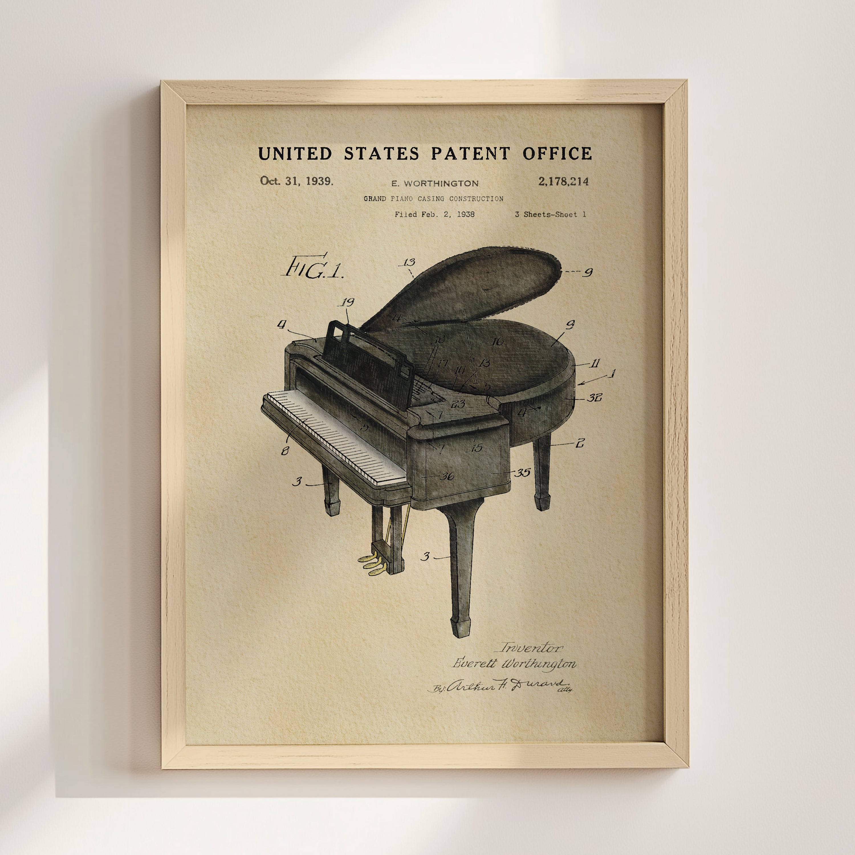The image is a framed patent drawing of a grand piano, depicting the design and construction of the instrument.