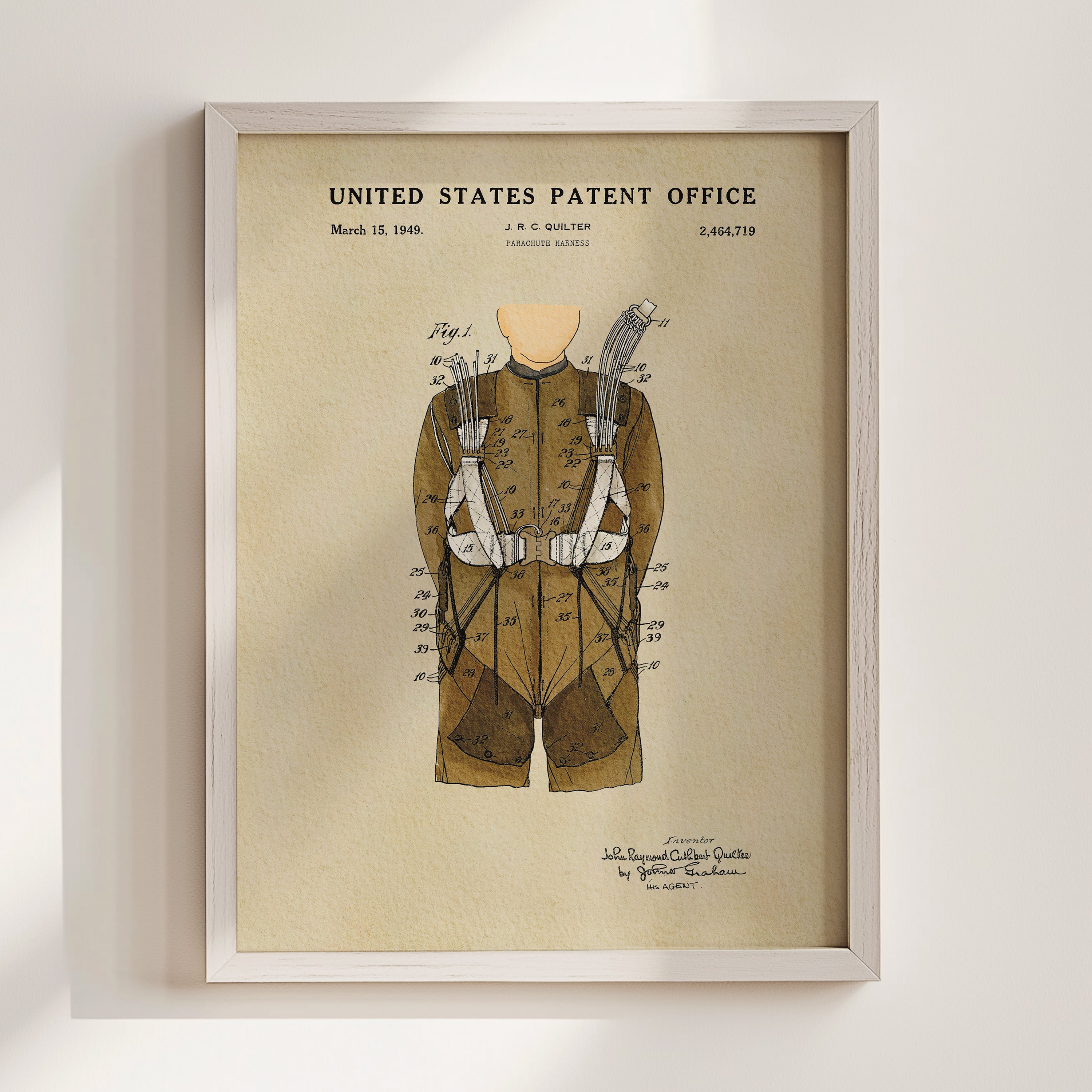 The image is a framed patent drawing depicting a parachute, with the United States Patent Office and the patent number 2,664,719 printed on the drawing.