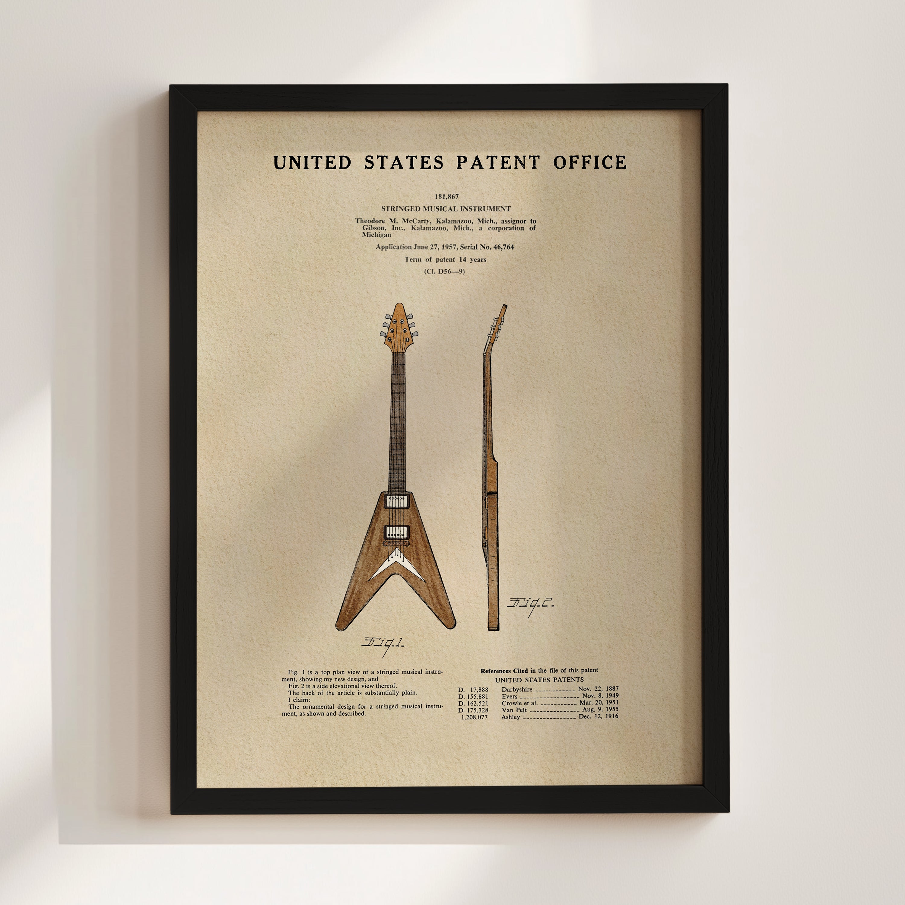 The image is a framed patent drawing of a guitar, depicting the design and features of the instrument.