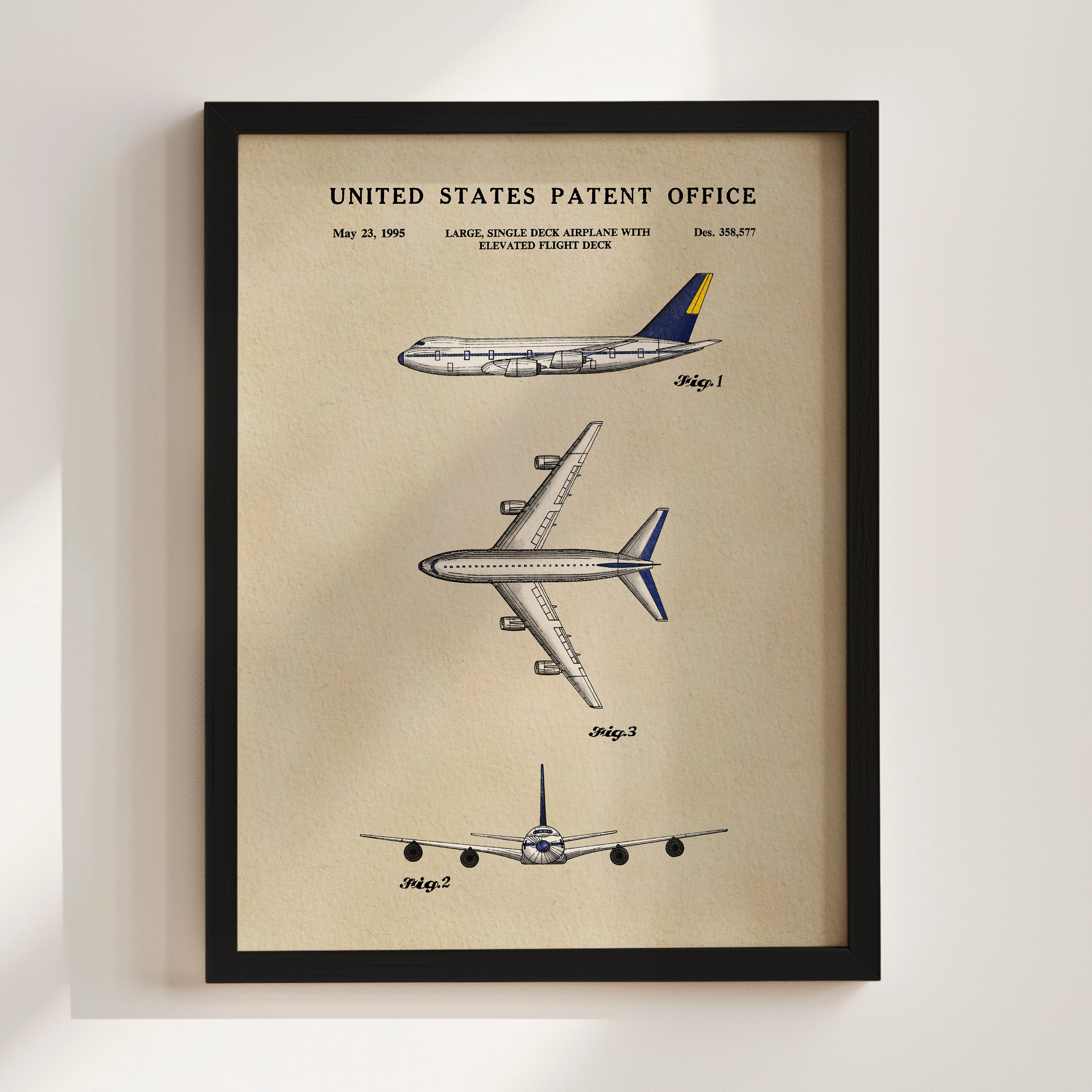 The image is a framed patent drawing depicting three different airplanes, including a large single-engine airplane with an elevated flight deck.