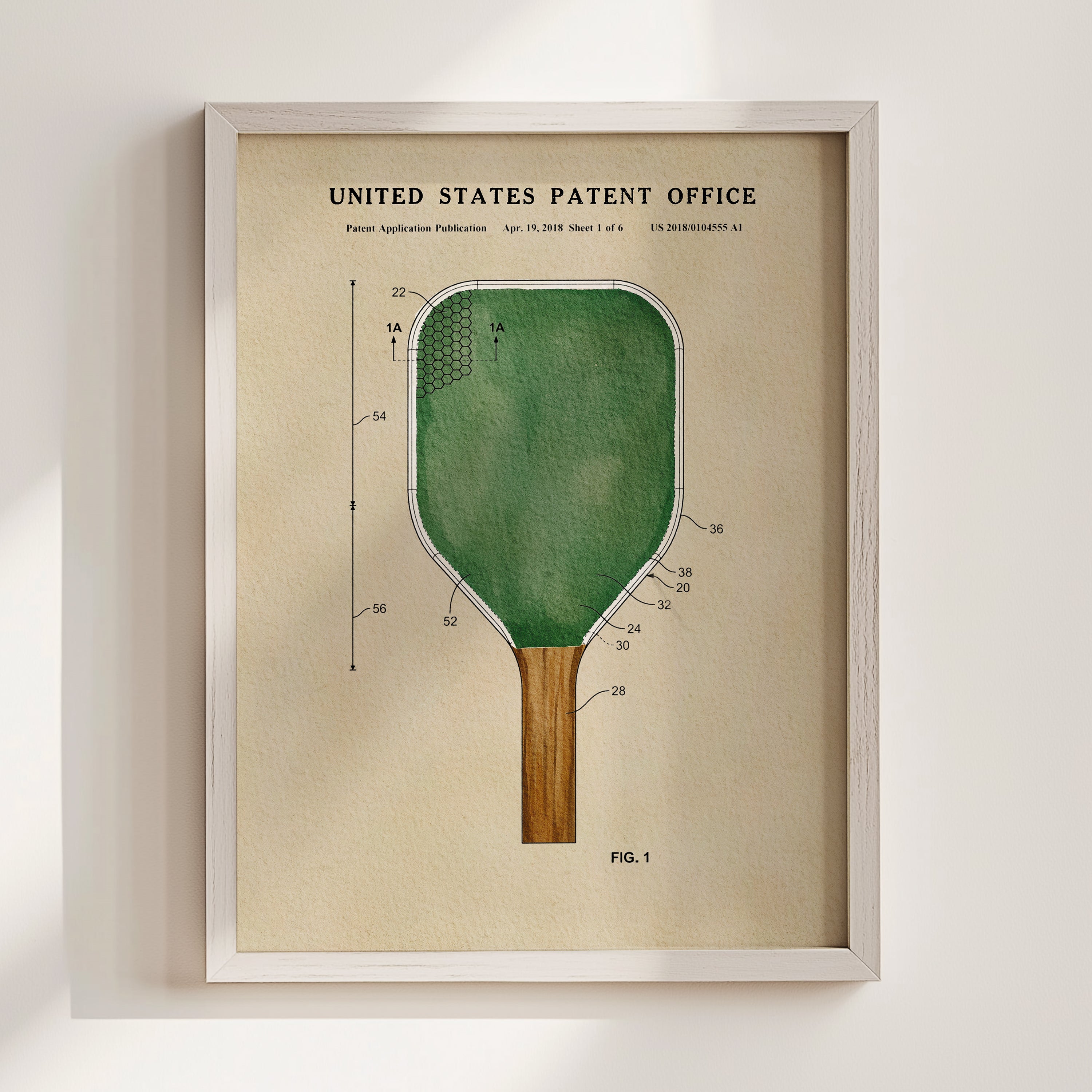 The image is a framed patent drawing of a paddle, depicting the design and features of the paddle in a detailed manner.