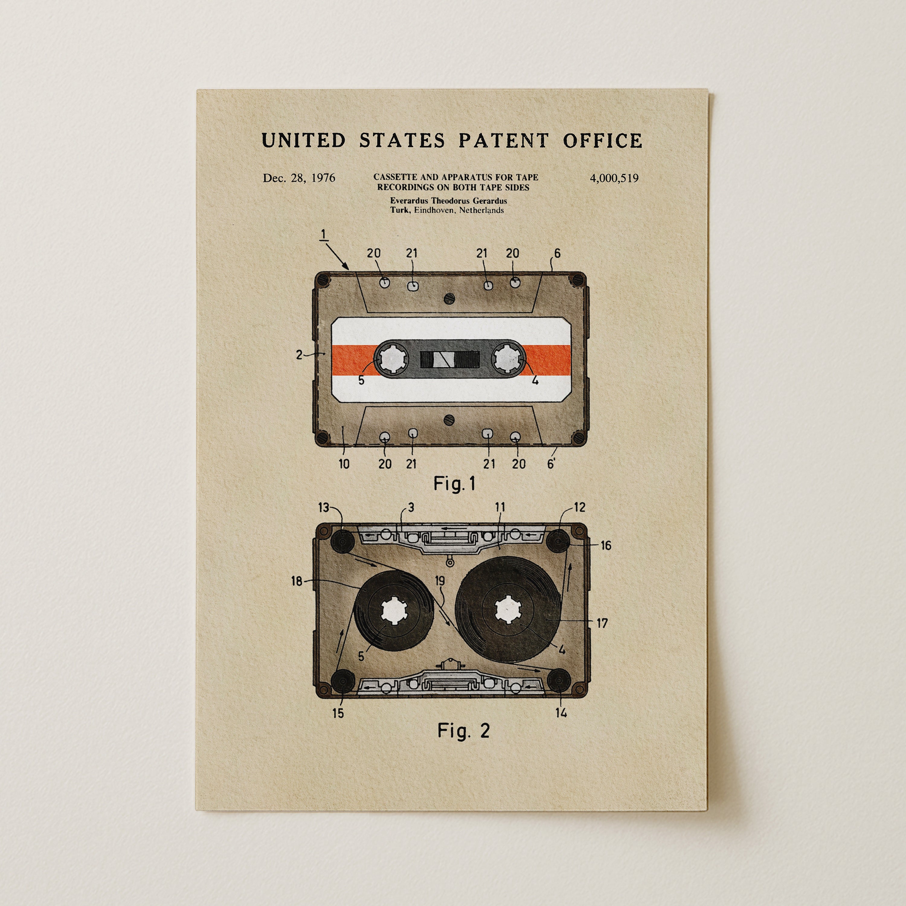 The image is a vintage United States patent office patent for a cassette and tape, dated December 28, 1976. It features two technical drawings of a cassette tape and a tape, along with the text 