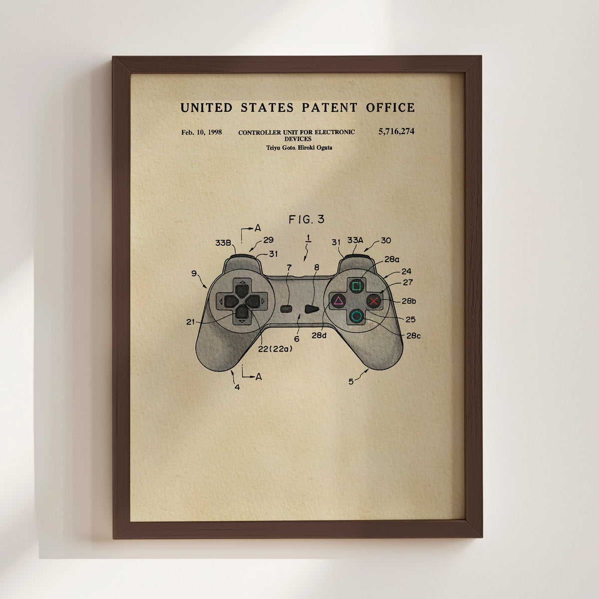 The image is a framed print of a United States patent office patent from February 10, 1998, titled "Controls for Electronic Toy Gui".