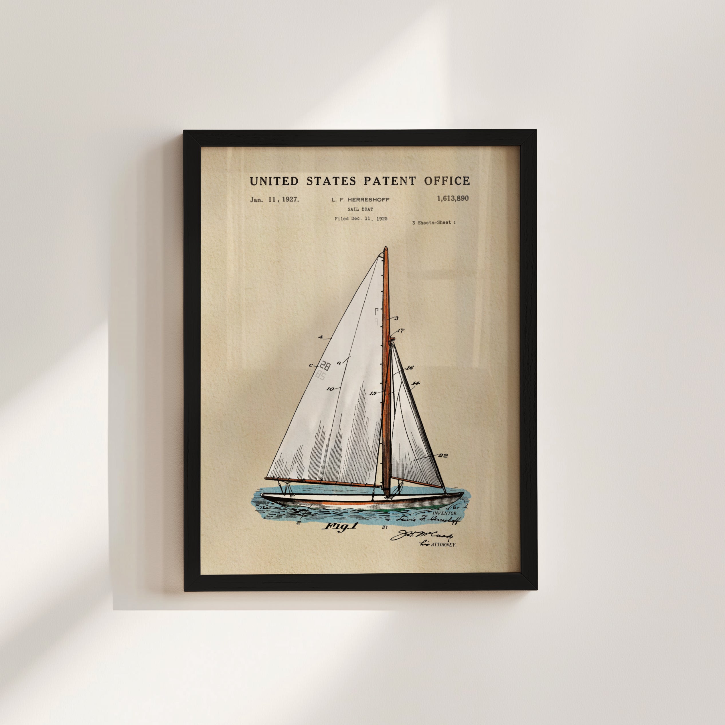 A framed illustration of a sailboat with a United States Patent Office label.