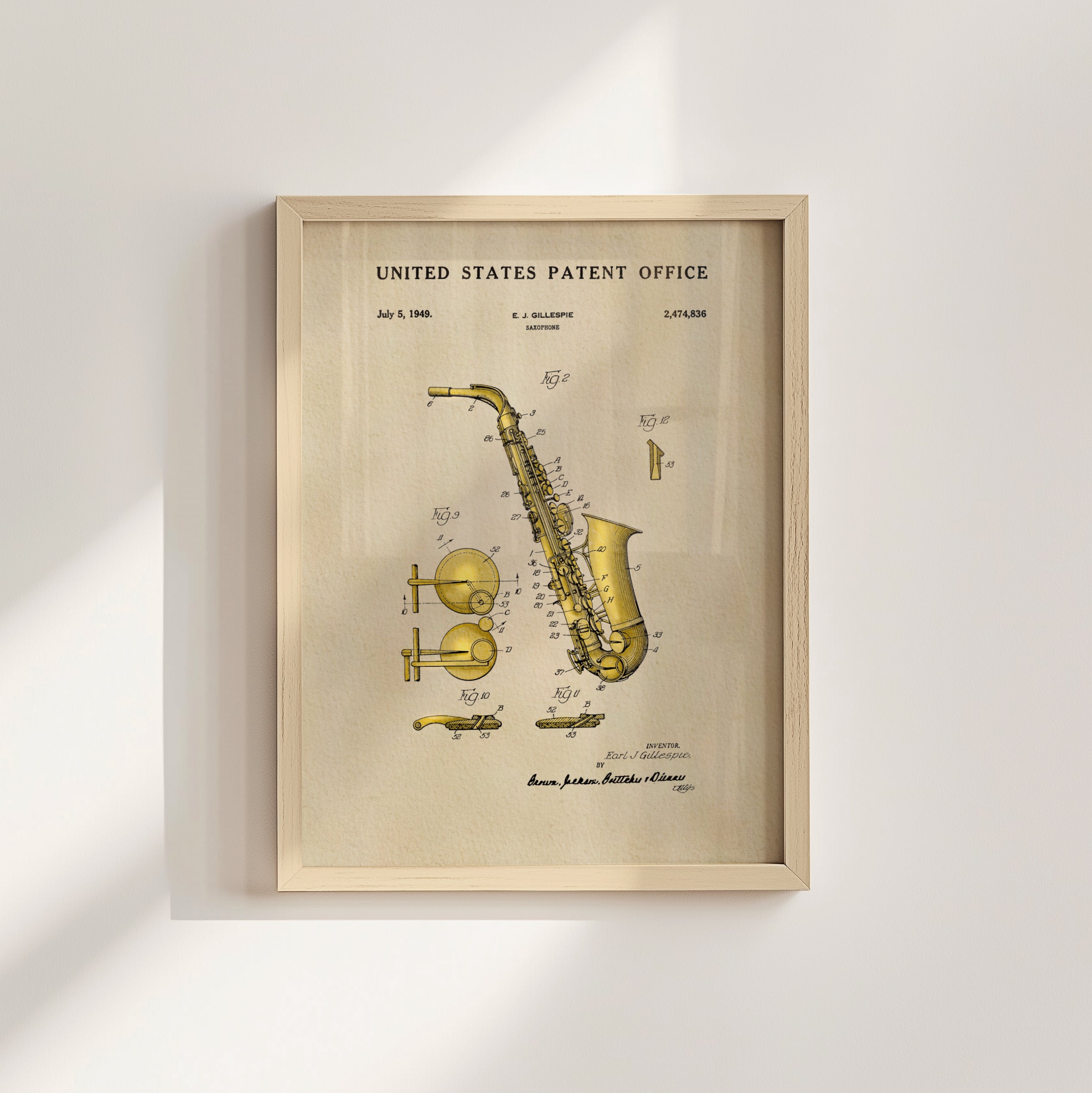The image is a framed patent drawing of a saxophone, depicting its design and features.