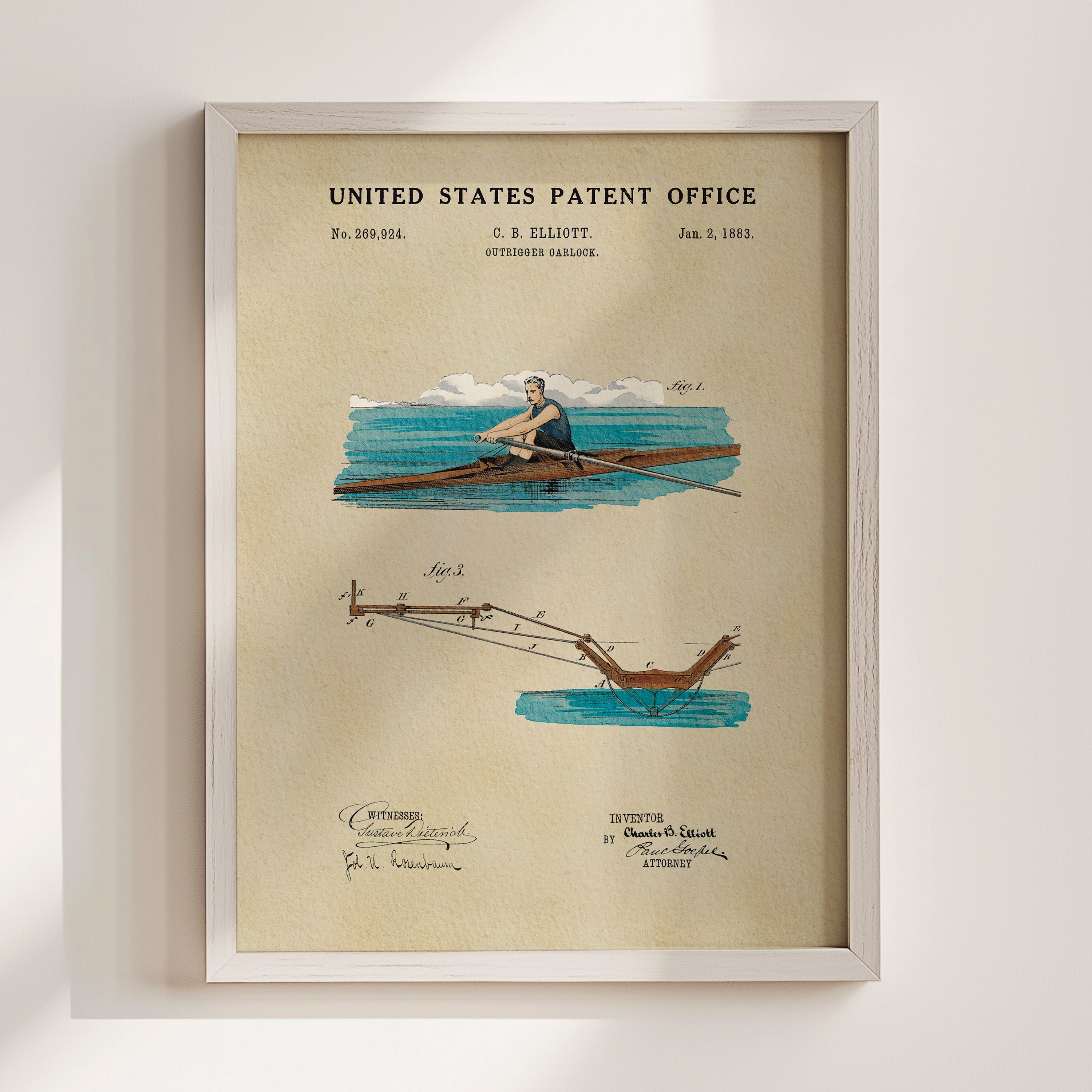 The image is a framed print depicting a rowing machine with a person rowing in it, along with a drawing of the rowing machine and a diagram of the rowing mechanism.